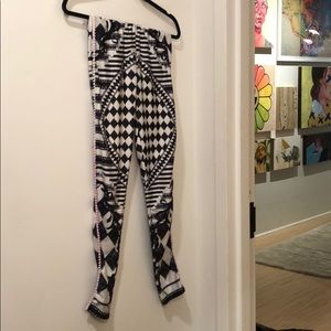 Black and white legging with Pom Pom fringe sides